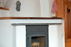 Feldingalm-Hofgastein-Wohnbereich-Kachelofen