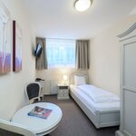 Photo of Einzelzimmer im Souterrain 1 Pers. long ohne ÜF