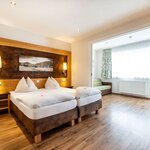 Photo of Familienzimmer Deluxe ,WC/Bad getrennt, (4 Pers)