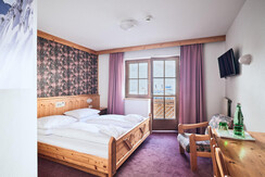 Doppelzimmer mit Balkon im Hotel Enzian