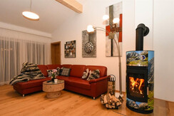 Sofa mit Ofen, Apartment Bergspitz 110m²