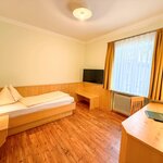 Photo of Eenvoudige eenpersoonskamer zonder balkon