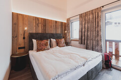Schlafzimmer mit Balkon Hochkönigblick