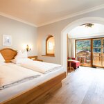 Photo of juniorsuite with shower or bath tube, WC