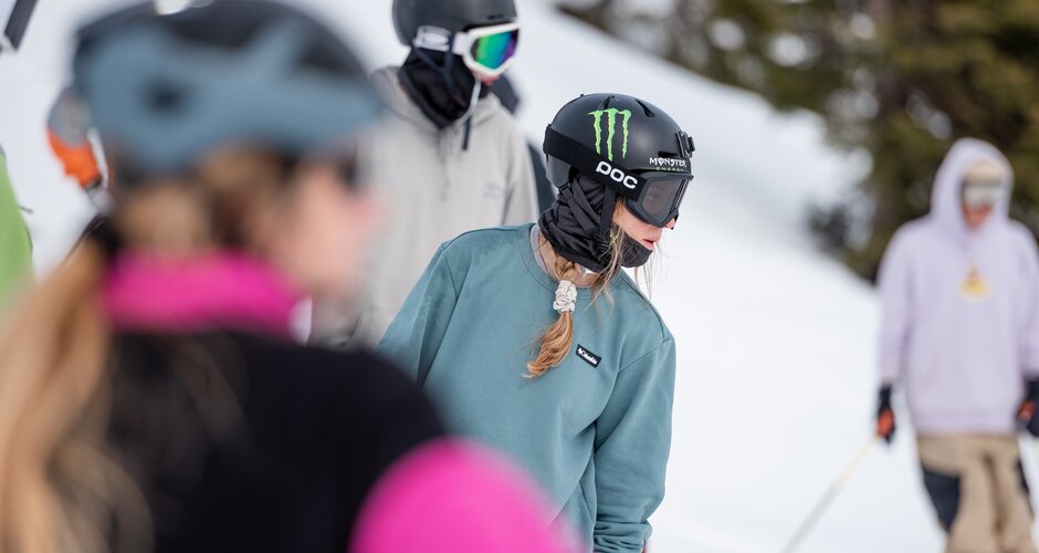 Freestyler photographed in side profile with view of the course