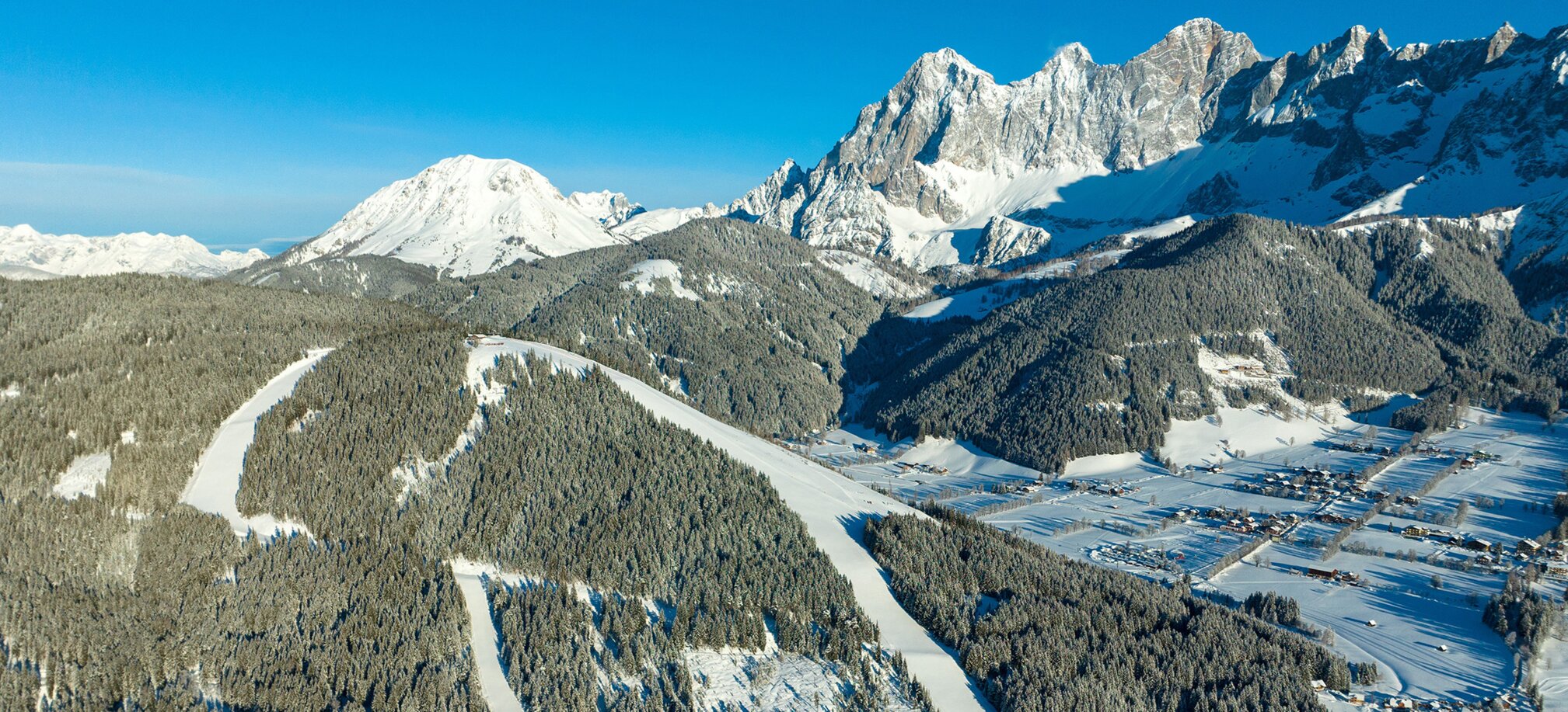 Ski mountain from above in winter and everything is covered in snow